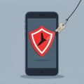 Smartphone showing a warning shield with a fishing hook lifting a key icon
