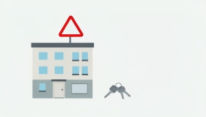 An apartment building with a blank yard sign, a set of keys, and a red warning triangle above it