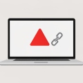 A laptop showing a blank content editor with a red error banner and a broken chain-link icon